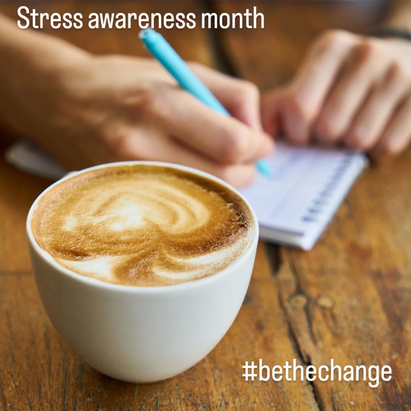 Coffee and someone writing a note. Stress Awareness #bethechange. The importance of taking regular breaks.